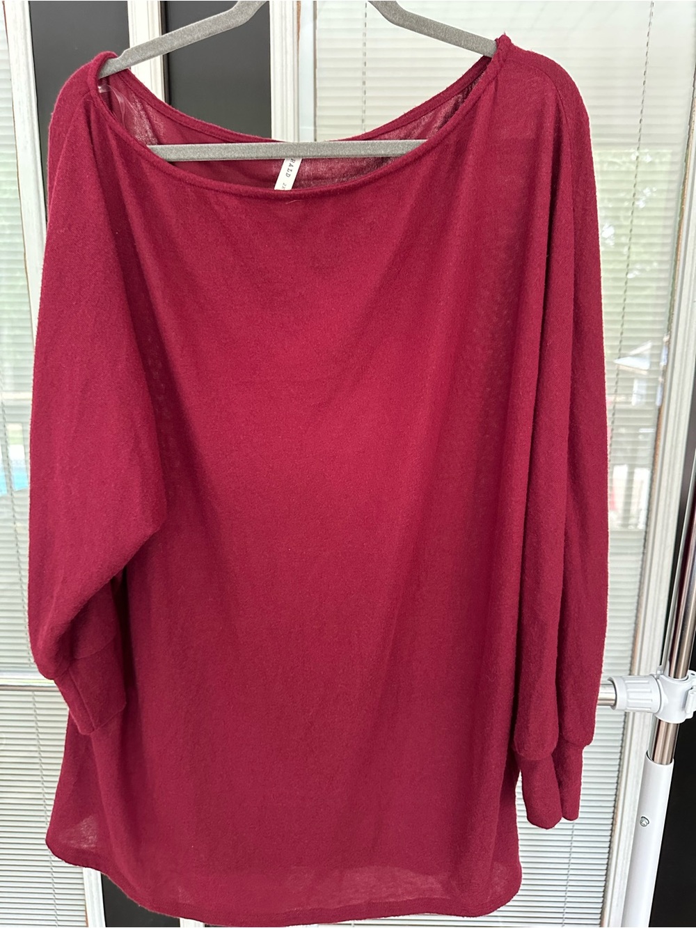 Sz 2X Emerald Women’s Lightweight Sweater in Wine. To be worn off one shoulder.